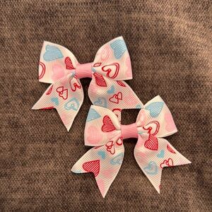 Pigtail bows- multiple sweet hearts on white background ribbon